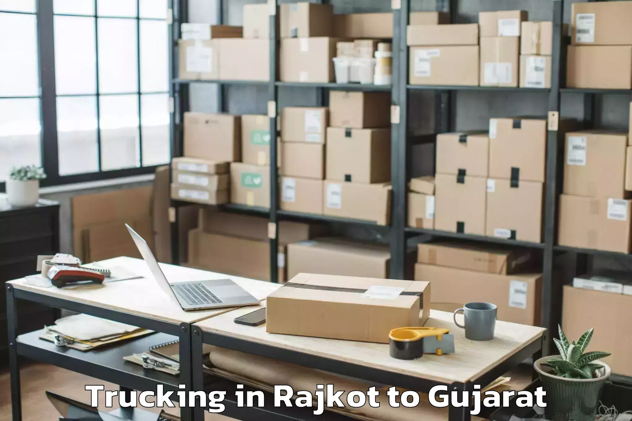 Book Your Rajkot to Kheralu Trucking Today